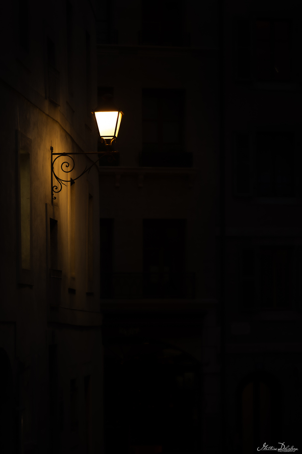 Warm Street Lamp in the Old Town of Geneva at Night