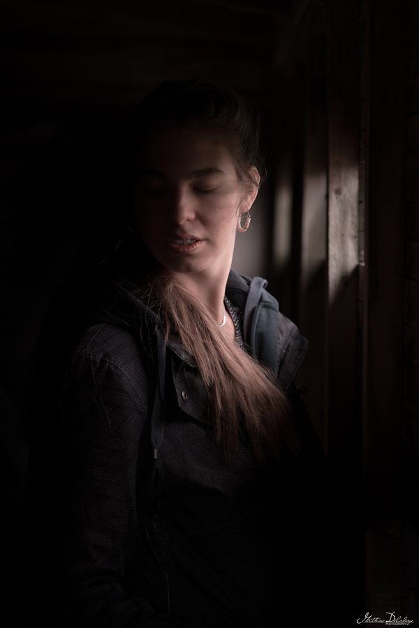 Introspective portrait of a Girl in Low-Key Natural Light